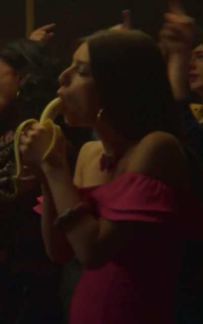 Mimi blowing a Banana