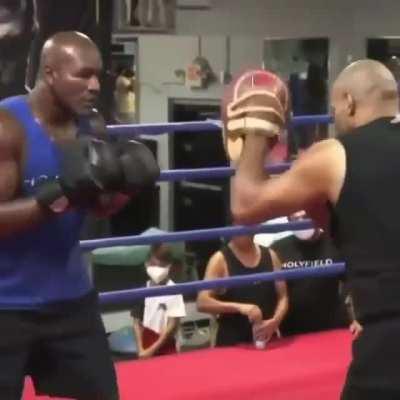 Evander Holyfield KILLING pads ahead of exhibition match with Vitor Belfort this Saturday.