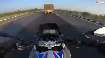 Biker narrowly avoids being smushed