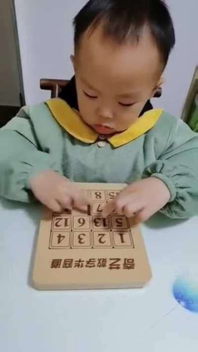 Little man doing this puzzle