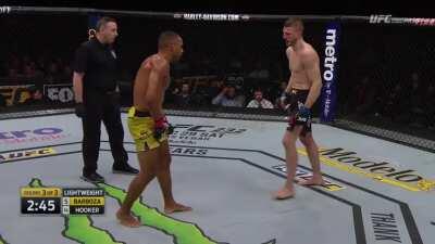 Dan Hooker crumbles after getting hit in the marshmallows by Edson Barboza. Dan Hooker is slated to fight Dustin Poirier on June 27.