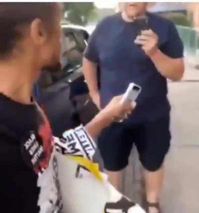 Man confronts the people who own the building he stapled his BLM signs to