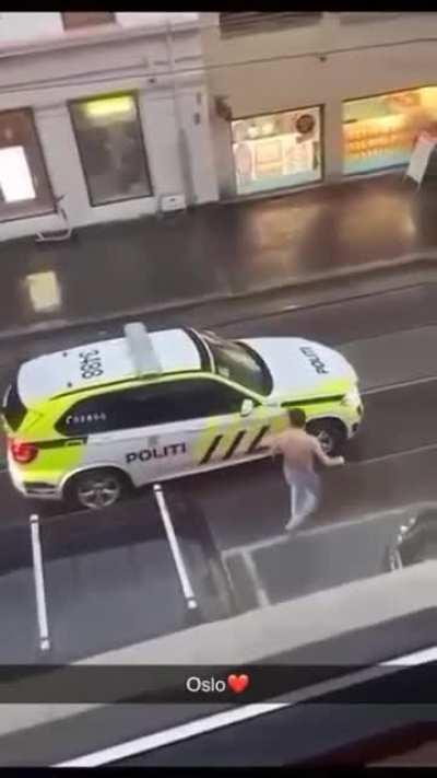 WCGW standing infront of police car with a knife