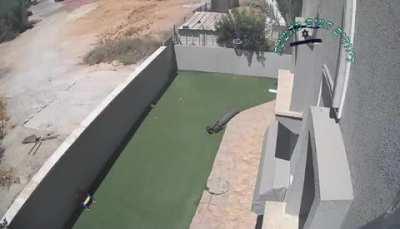 Video showing how the rocket fell onto the backyard in a settlement.