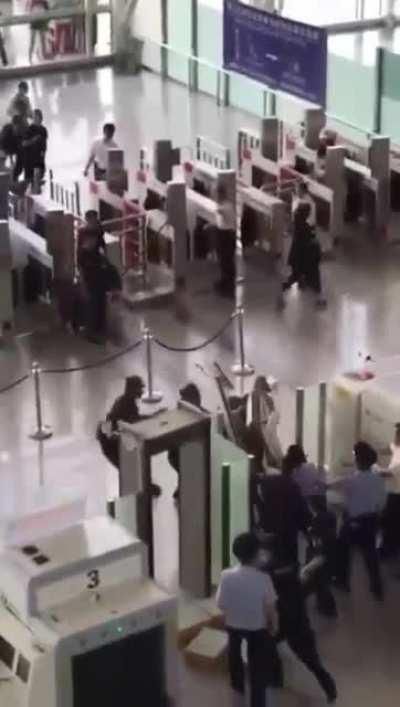 Who hasn't wanted to stomp a metal detector at the airport? This dude lives the dream.