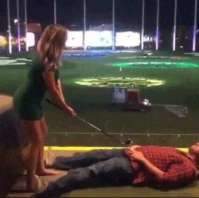 Letting someone swing a golf club 2 inches from your nuts