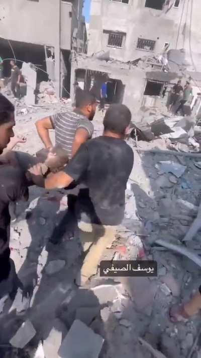 Saving a small girl from the rubble, She is asking them if you are taking me to the grave