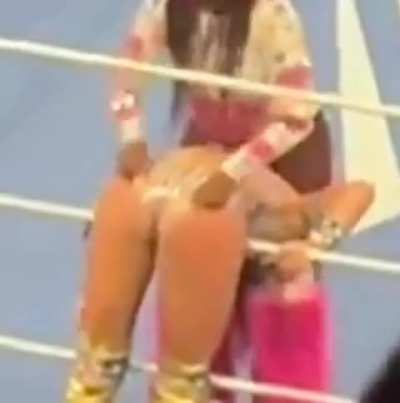 Another angle of Naomi giving Chelsea Green a wedgie