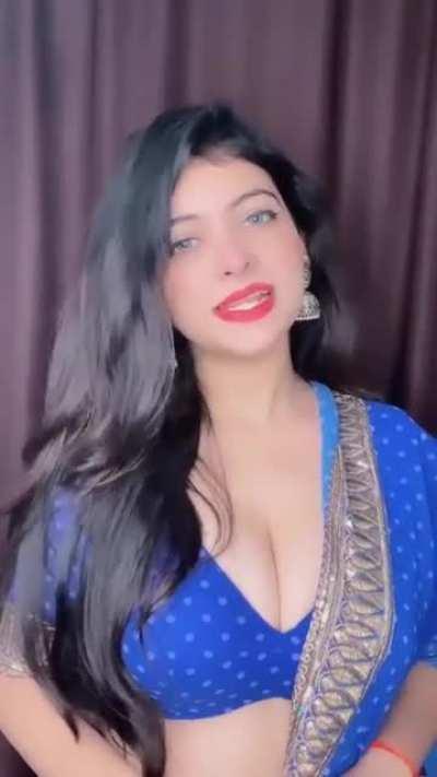 She is looking like a slut in this cloth who is showing her big boobs like a whore in brothel