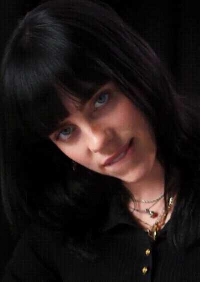 Billie Eilish gives you this look after telling you that she will dominate you tonight. How do you react?