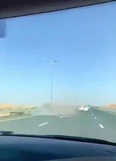 Tesla hitting a camel in the middle of the street, in Dubai.