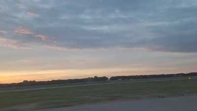 Flying out of Barcelona airport during the sunrise