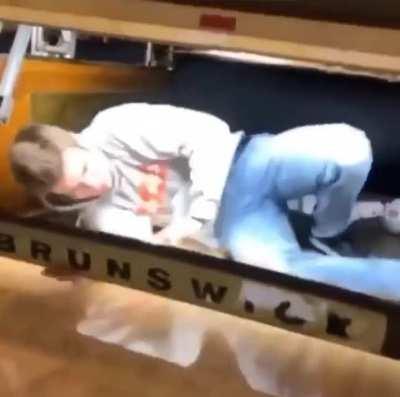 He held the bar as a shield