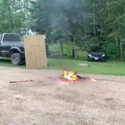 Spray paint is hit with a sledgehammer.