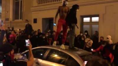 PSG fans destroying cars after their team lost in Champions League final