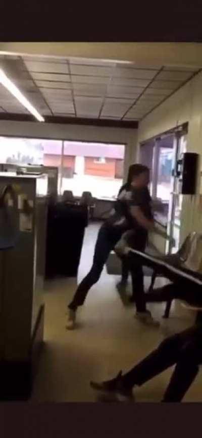 Kids fighting each other over a girl.