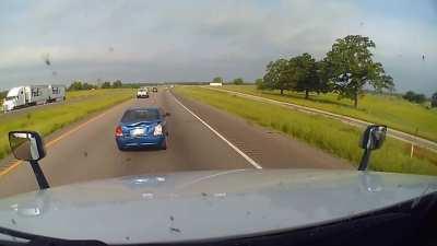 Car brakes abruptly and gets rear ended by a semi truck