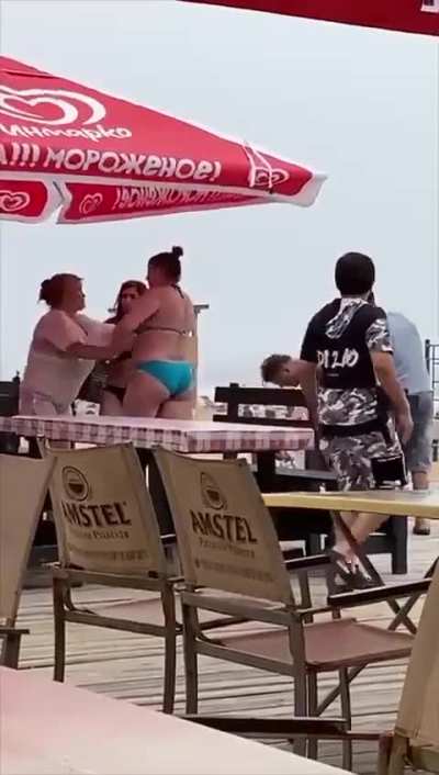 The woman knocked out the man who was trying to stop the fight