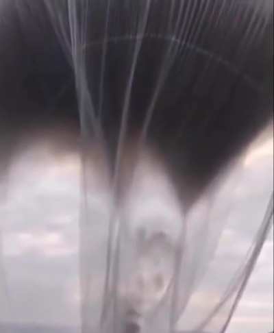 Smoke trapped in a plastic bag to demonstrate how one fire can generate significant pollution.