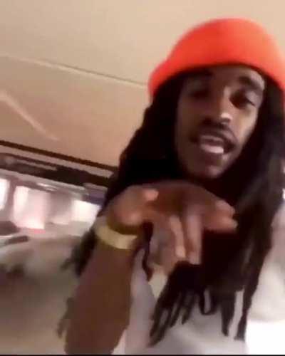 WCGW trying to act cool by sitting on-top a car