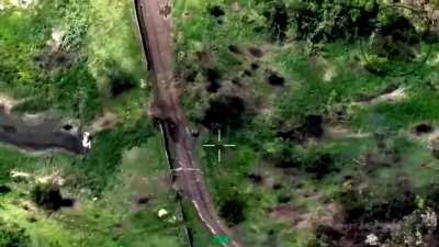 RU pov: Footage of an ukrainian attack getting repulsed by mortar fire, artillery fire and drone dropped grenades. Aftermath shows a group of KIA ukrainian soldiers. 