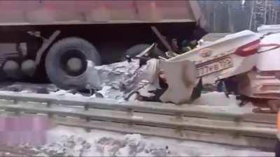 Truck pins Camry to guard rail through toll booth, 1 dead, 1 injured, Odintsovo, Russia