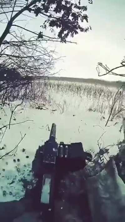 Ukrainian soldiers of the Fire Support Company of the 2nd Airborne Assault Battalion of the 80th Separate Airborne Assault Brigade fire at Russian positions with 30-mm AGS-17 