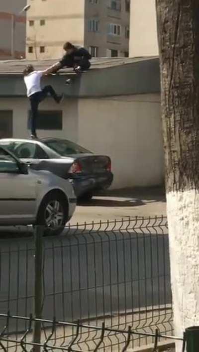 Win stupid prize by trying to help a friend to get to the roof...