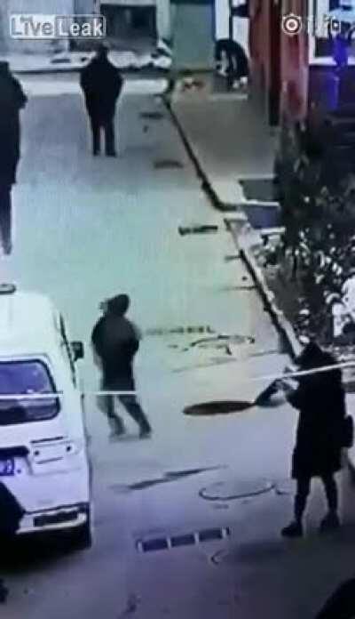 child puts firecracker in manhole...