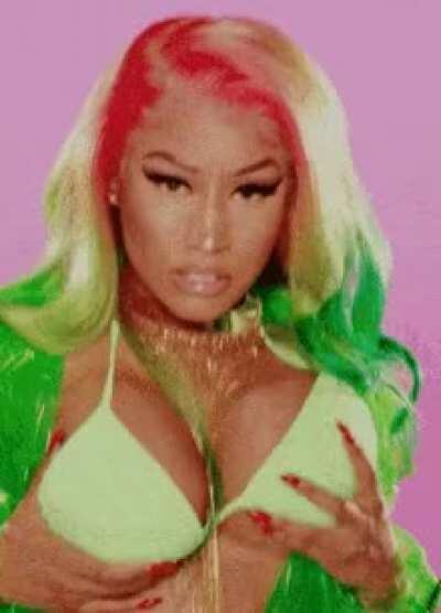 Juggling those tits.