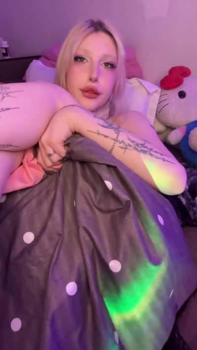 Relaxed posture and subtle tease