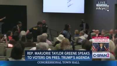Protestor to Rep. Marjorie Taylor Greene: 
