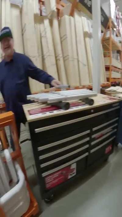 Performing the Home Depot theme inside Home Depot using DIY items.