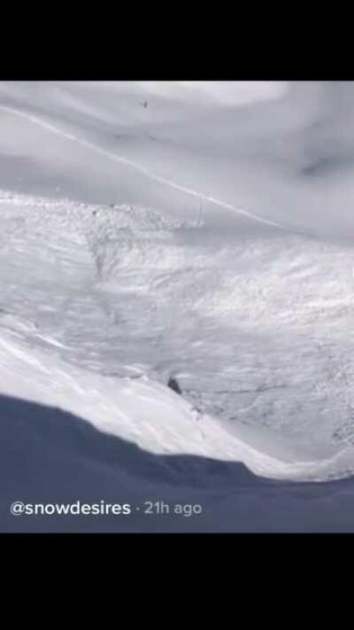 Snowboarder barely escapes the grips of a deadly avalanche