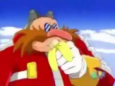 Eggman about to consume a banana