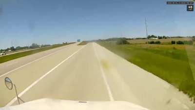 In case anyone wandered what a FPV is like of a semi tire letting go, here yah go. I was doing 70 when this happened.(OC)