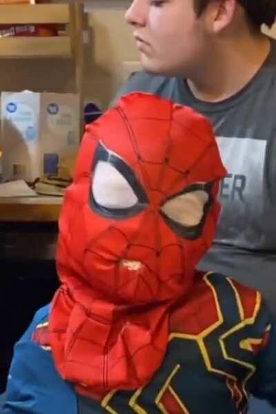 Spiderboy eating a cookie