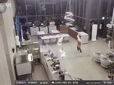 Guy walks in on worker dancing like a rock star