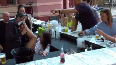 Couple fucking at the open bar