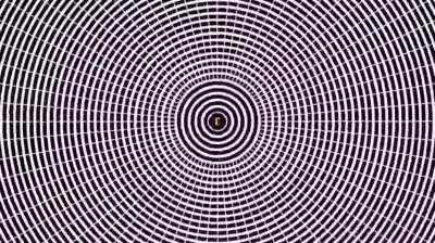 This video is designed to create a natural hallucination based on the motion aftereffect illusion