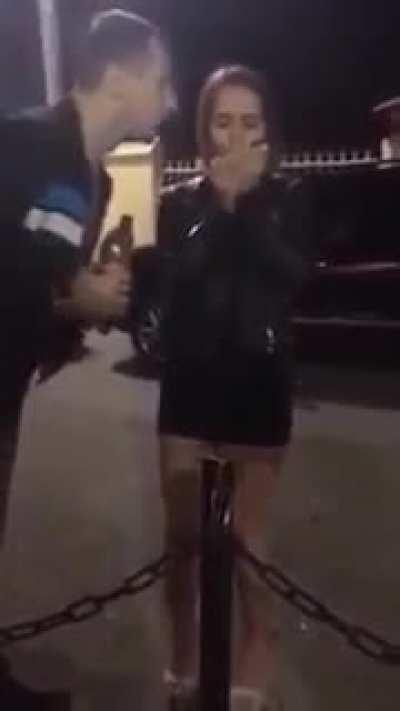 Man elbows woman’s face after she flicks the match at him. Looks like severe head trauma. don’t know anything about this video