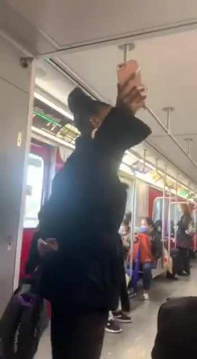 Racist & homophobic woman harasses man on Toronto subway