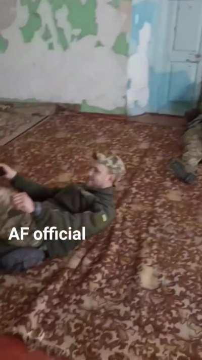 Ukrainian soldiers taking a break from the fighting 