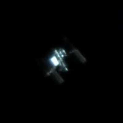 ISS flying over my backyard, shot with my 12