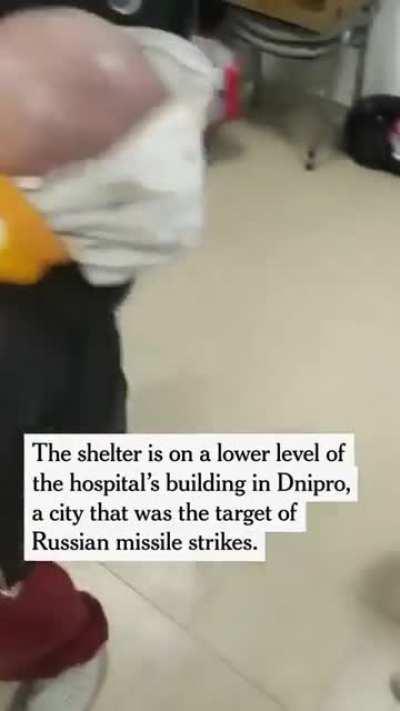 Nurses and doctors moved newborns into a makeshift bomb shelter in a Ukrainian hospital in Dnipro.