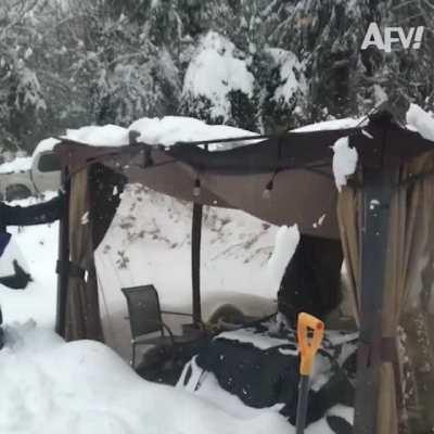 WCGW clearing snow from patio furniture