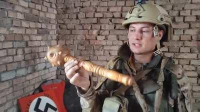 ( post in 3 parts ) part 1 - In the first video, Russian drone pilot, military man, Z-volunteer and author of the Misha in Donbass channel, Misha Luchin, shoots a terribly primitive ipso video with a swastika and a mace allegedly found at the positions of