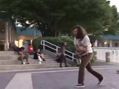 Doing tricks on two skateboards at once