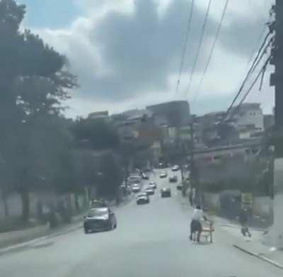 WCGW riding a shopping cart in the road
