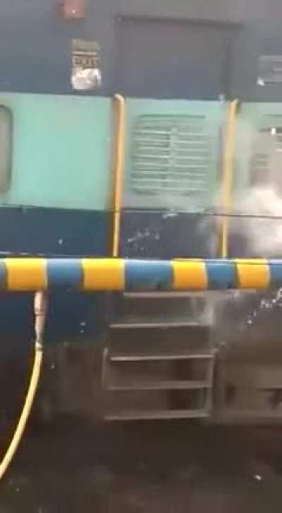 Free showering service sponsored by the Indian railway.